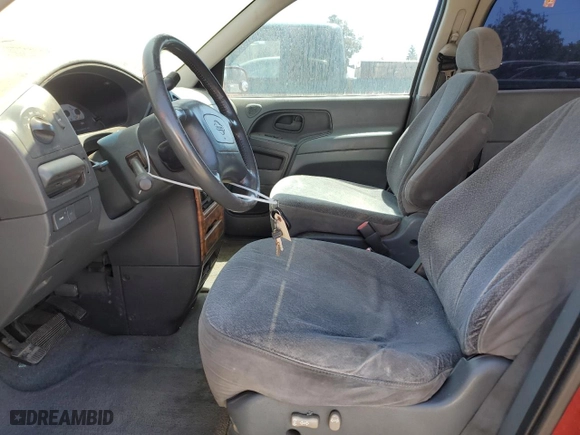 1999 Nissan Quest GXE with VIN 4N2XN11T1XD821204, listed as a Copart auction lot 69671334 with 171,887 mi miles and Salvage Title. Bid and sale history available at carsss.com. Image 7.