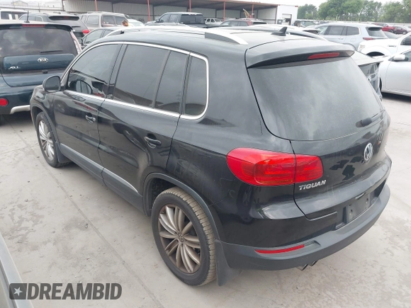 2012 Volkswagen Tiguan SE with VIN WVGAV7AX9CW611202, listed as a IAAI auction lot 41944210 with 118,002 mi miles and . Bid and sale history available at DreamBid. Image 3.