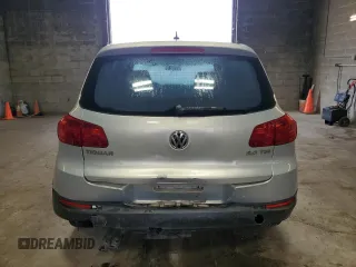 2013 Volkswagen Tiguan S with VIN WVGAV3AX9DW626065, listed as a Copart auction lot 58014145 with 128,858 mi miles and Salvage title. Bid and sale history available at DreamBid. Image 6.