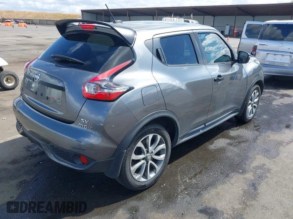 2015 Nissan Juke S with VIN JN8AF5MRXFT513258, listed as a IAAI auction lot 42213721 with 91,972 mi miles and . Bid and sale history available at DreamBid. Image 4.