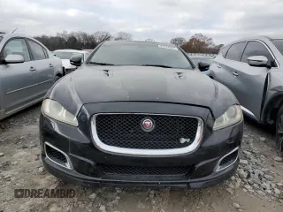 2014 Jaguar XJ with VIN SAJWA2EKXEMV64494, listed as a Copart auction lot 82634004 with 119,811 mi miles and Clean title. Bid and sale history available at DreamBid. Image 5.