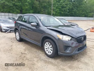 2014 Mazda CX-5 Sport z VIN JM3KE2BE5E0350057, wystawiony jako IAAI lot #42145910 z przebiegiem 157 517 mil mil oraz . Historia ofert i sprzedaży dostępna na DreamBid. Obrazek 1.