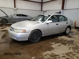 2001 Nissan Altima GXE with VIN 1N4DL01D11C184591, listed as a Copart auction lot 41699465 with 104,431 mi miles and Salvage Title. Bid and sale history available at carsss.com. Image 1.