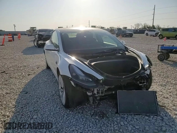 2023 Tesla Model 3 with VIN 5YJ3E1EA4PF631304, listed as a Copart auction lot 52500695 with 33,024 mi miles and Salvage title. Bid and sale history available at DreamBid. Image 11.