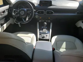 2018 Mazda CX-5 Grand Touring with VIN JM3KFADM5J0350937, listed as a Copart auction lot 46525965 with 59,478 mi miles and Salvage Title. Bid and sale history available at DreamBid. Image 8.