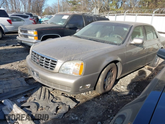 2002 Cadillac DeVille DHS z VIN 1G6KE57Y22U225134, wystawiony jako IAAI lot #41350531 z przebiegiem 126 457 mil mil oraz . Historia ofert i sprzedaży dostępna na DreamBid. Obrazek 2.