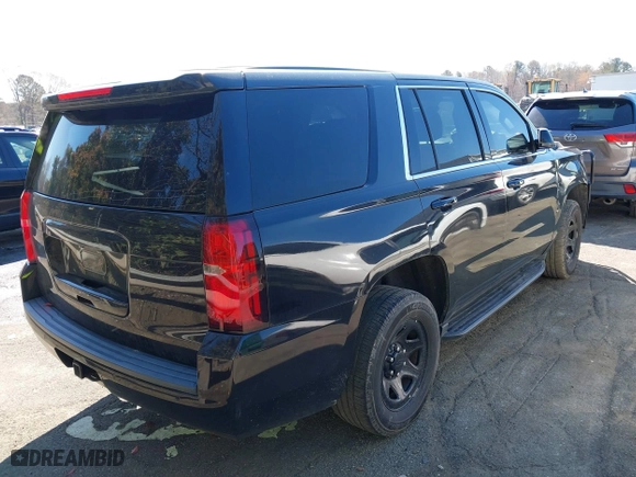 2019 Chevrolet Tahoe Commercial with VIN 1GNLCDECXKR133529, listed as a IAAI auction lot 41890263 with 160,227 mi miles. Bid and sale history available at carsss.com. Image 4.