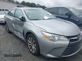 2015 Toyota Camry XLE with VIN 4T1BF1FKXFU955780, listed as a IAAI auction lot 41731667 with 210,750 mi miles and . Bid and sale history available at DreamBid. Image 1.