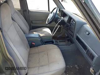 1996 Jeep Cherokee Sport with VIN 1J4FJ68S0TL211339, listed as a IAAI auction lot 42164217 with 193,080 mi miles and . Bid and sale history available at DreamBid. Image 5.