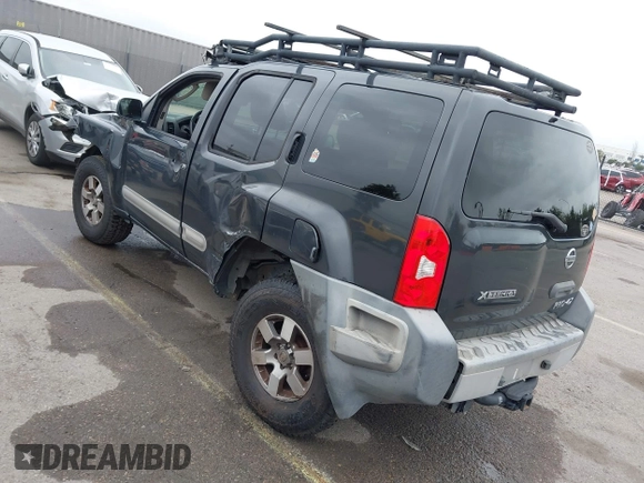 2012 Nissan Xterra S with VIN 5N1AN0NW4CC523071, listed as a IAAI auction lot 41874263 with 154,556 mi miles and . Bid and sale history available at DreamBid. Image 3.