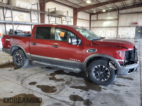 2017 Nissan Titan Platinum Reserve with VIN 1N6AA1E52HN501110, listed as a Copart auction lot 48202935 with 83,674 mi miles and Salvage title. Bid and sale history available at DreamBid. Image 4.