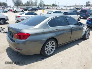 2014 BMW 5 Series 535i xDrive with VIN WBA5B3C57ED531072, listed as a IAAI auction lot 42574991 with 104,304 mi miles and . Bid and sale history available at DreamBid. Image 4.