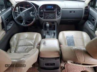 2002 Mitsubishi Montero Limited z VIN JA4MW51R52J027289, wystawiony jako Copart lot #71921024 z przebiegiem 199 334 mil mil oraz Tytuł czysty. Historia ofert i sprzedaży dostępna na DreamBid. Obrazek 8.