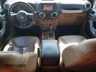 2016 Jeep Wrangler Unlimited Sahara z VIN 1C4BJWEG3GL115814, wystawiony jako Copart lot #62281895 z przebiegiem 75 039 mil mil oraz Szkoda całkowita • Salvage title. Historia ofert i sprzedaży dostępna na DreamBid. Obrazek 8.