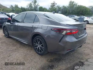 2023 Toyota Camry SE with VIN 4T1G11AK6PU761681, listed as a IAAI auction lot 41766008 with 18,690 mi miles. Bid and sale history available at carsss.com. Image 3.