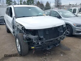 2018 Jeep Grand Cherokee Laredo E with VIN 1C4RJEAG2JC402812, listed as a IAAI auction lot 41439871 with 114,535 mi miles. Bid and sale history available at carsss.com. Image 6.