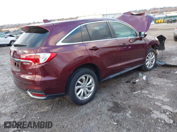 2017 Acura RDX w/Technology Pkg with VIN 5J8TB4H5XHL029032, listed as a IAAI auction lot 40982964 with 124,253 mi miles. Bid and sale history available at carsss.com. Image 4.