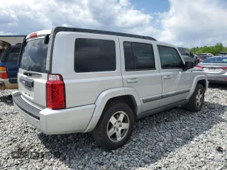 2009 Jeep Commander Sport with VIN 1J8HH48K89C540189, listed as a Copart auction lot 52552235 with 258,377 mi miles and Salvage title. Bid and sale history available at DreamBid. Image 3.