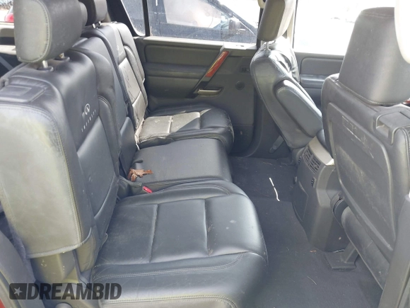 2004 Infiniti QX56 with VIN 5N3AA08C24N803775, listed as a IAAI auction lot 41909960 with 238,887 mi miles. Bid and sale history available at carsss.com. Image 8.