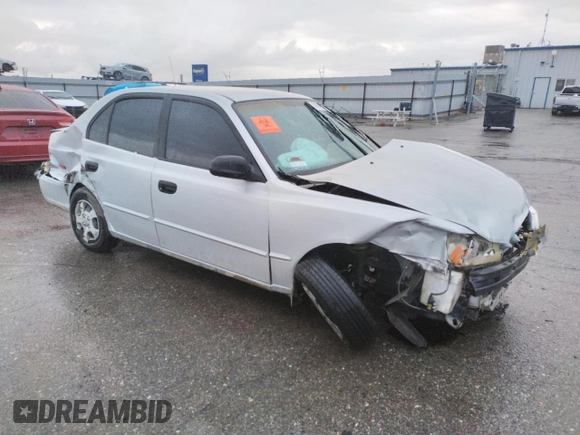 2002 Hyundai Accent GL with VIN KMHCG45C02U301443, listed as a Copart auction lot 80670164 with 124,163 mi miles and Salvage Title. Bid and sale history available at carsss.com. Image 4.