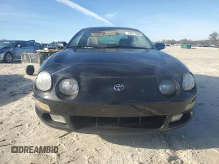 1997 Toyota Celica GT with VIN JT2DG02TXV0040610, listed as a Copart auction lot 79677454 with 179,749 mi miles and Salvage Title. Bid and sale history available at carsss.com. Image 5.