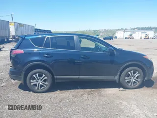 2017 Toyota RAV4 LE with VIN JTMBFREV8HJ168975, listed as a IAAI auction lot 42139354 with 91,394 mi miles and . Bid and sale history available at DreamBid. Image 13.