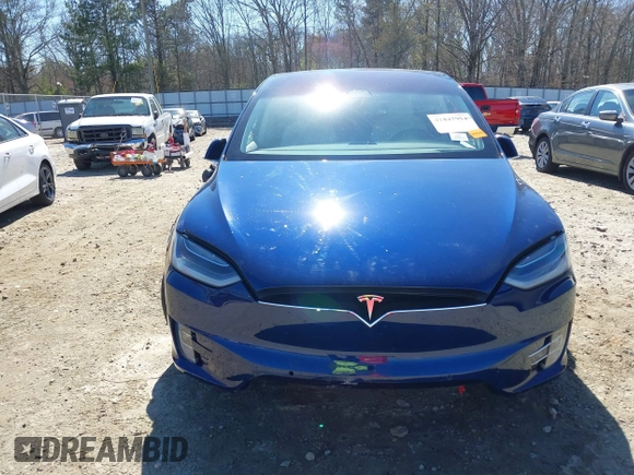 2017 Tesla Model X 90D z VIN 5YJXCBE26HF079022, wystawiony jako IAAI lot #41847954 z przebiegiem 74 940 mil mil oraz . Historia ofert i sprzedaży dostępna na DreamBid. Obrazek 13.