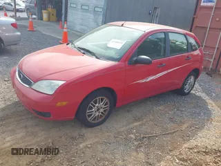 2007 Ford Focus S with VIN 1FAFP37N77W156235, listed as a IAAI auction lot 42106035 with 182,762 mi miles and . Bid and sale history available at carsss.com. Image 2.