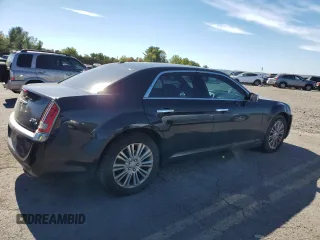 2013 Chrysler 300 C with VIN 2C3CCAKG0DH683117, listed as a Copart auction lot 74812334 with 187,308 mi miles and Salvage Title. Bid and sale history available at DreamBid. Image 3.
