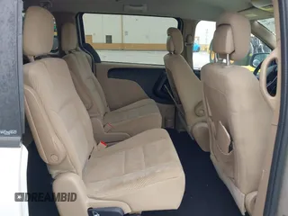 2014 Dodge Grand Caravan SXT z VIN 2C4RDGCGXER322705, wystawiony jako IAAI lot #42450791 z przebiegiem 147 113 mil mil oraz . Historia ofert i sprzedaży dostępna na DreamBid. Obrazek 8.