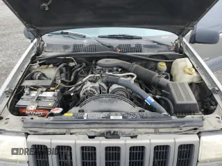 1997 Jeep Grand Cherokee Laredo with VIN 1J4GZ58Y5VC637350, listed as a Copart auction lot 77405444 with 182,482 mi miles and Clean Title. Bid and sale history available at carsss.com. Image 12.