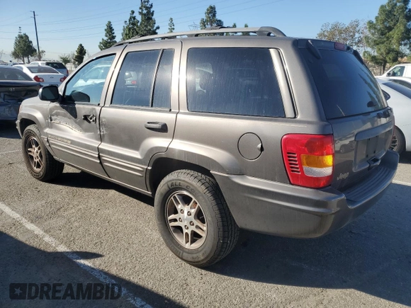 1999 Jeep Grand Cherokee Limited with VIN 1J4G268SXXC759016, listed as a Copart auction lot 80307534 with 215,870 mi miles and Salvage title. Bid and sale history available at DreamBid. Image 2.