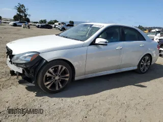 2014 Mercedes-Benz E 350 Sport with VIN WDDHF5KB0EA799279, listed as a Copart auction lot 61617125 with 164,008 mi miles and Salvage title. Bid and sale history available at DreamBid. Image 1.
