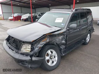 2004 Toyota Land Cruiser with VIN JTEHT05JX42059414, listed as a IAAI auction lot 41919791 with 210,528 mi miles. Bid and sale history available at carsss.com. Image 6.