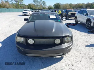 2005 Ford Mustang Deluxe with VIN 1ZVFT80N655136118, listed as a IAAI auction lot 41811969 with 104,071 mi miles. Bid and sale history available at carsss.com. Image 12.