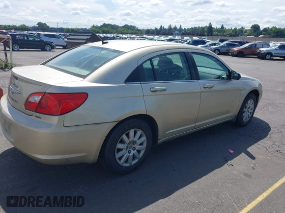 2010 Chrysler Sebring Touring z VIN 1C3CC4FBXAN144734, wystawiony jako IAAI lot #42548485 z przebiegiem 160 588 mil mil oraz . Historia ofert i sprzedaży dostępna na DreamBid. Obrazek 4.