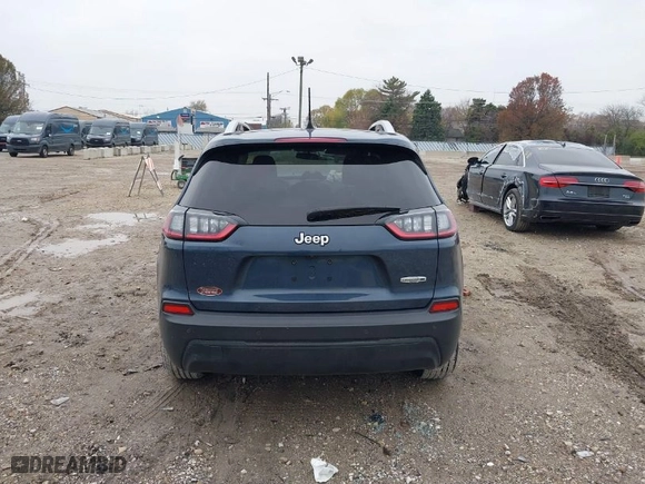 2019 Jeep Cherokee Latitude Plus with VIN 1C4PJLLB0KD434960, listed as a IAAI auction lot 40851354 with 111,989 mi miles. Bid and sale history available at carsss.com. Image 16.