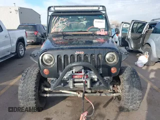 2009 Jeep Wrangler Unlimited Rubicon z VIN 1J4GA69159L749215, wystawiony jako IAAI lot #41489893 z przebiegiem 177 768 mil mil oraz . Historia ofert i sprzedaży dostępna na DreamBid. Obrazek 12.