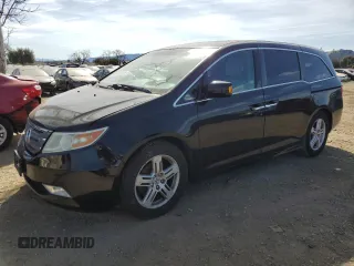 2012 Honda Odyssey Touring with VIN 5FNRL5H99CB004746, listed as a Copart auction lot 46480475 with 129,457 mi miles and Salvage Title. Bid and sale history available at carsss.com. Image 1.