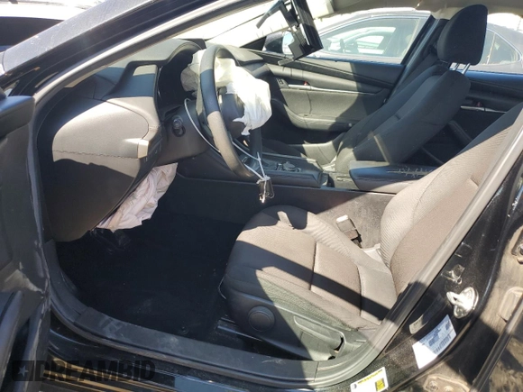 2021 Mazda 3 2.0 with VIN 3MZBPAA71MM204263, listed as a Copart auction lot 77597674 with Not Provided miles and Salvage Title. Bid and sale history available at DreamBid. Image 7.