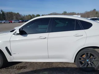 2015 BMW X6 xDrive35i with VIN 5UXKU2C50F0N77117, listed as a IAAI auction lot 41901159 with 104,820 mi miles. Bid and sale history available at carsss.com. Image 15.