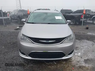 2018 Chrysler Pacifica Touring L with VIN 2C4RC1BGXJR142295, listed as a IAAI auction lot 41952592 with 135,092 mi miles and . Bid and sale history available at DreamBid. Image 12.