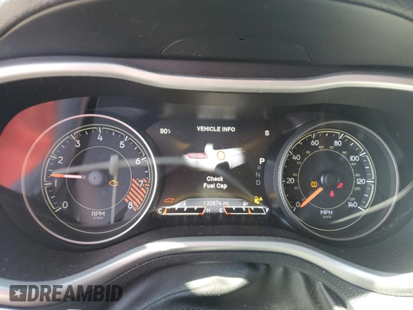 2015 Jeep Cherokee Trailhawk with VIN 1C4PJMBS0FW705288, listed as a Copart auction lot 61796275 with 133,874 mi miles and Salvage title. Bid and sale history available at DreamBid. Image 9.