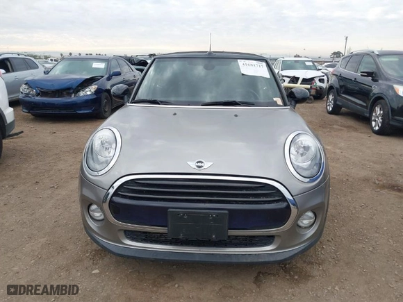 2016 MINI Cooper Convertible with VIN WMWWG5C51G3A81075, listed as a IAAI auction lot 41681717 with 54,956 mi miles. Bid and sale history available at carsss.com. Image 12.