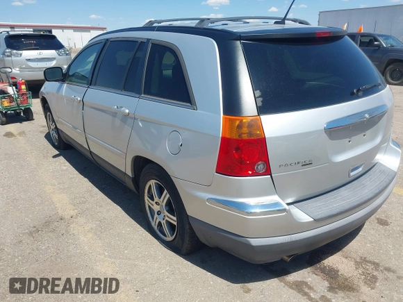 2007 Chrysler Pacifica Touring z VIN 2A8GM68X67R239407, wystawiony jako IAAI lot #42241988 z przebiegiem 198 699 mil mil oraz . Historia ofert i sprzedaży dostępna na DreamBid. Obrazek 3.