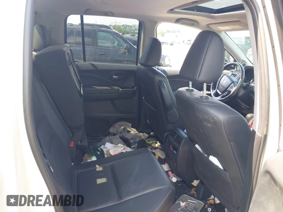 2019 Honda Ridgeline RTL-E with VIN 5FPYK3F71KB017906, listed as a IAAI auction lot 42670476 with 58,288 mi miles and . Bid and sale history available at DreamBid. Image 8.