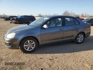 2007 Volkswagen Jetta z VIN 3VWRF31K27M201393, wystawiony jako Copart lot #54317795 z przebiegiem 235 343 mil mil oraz Szkoda całkowita • Salvage title. Historia ofert i sprzedaży dostępna na DreamBid. Obrazek 1.