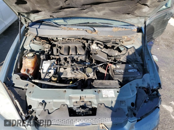 2006 Ford Taurus SE with VIN 1FAFP53U96A226497, listed as a Copart auction lot 82565654 with Not Provided miles and Salvage Title. Bid and sale history available at DreamBid. Image 11.