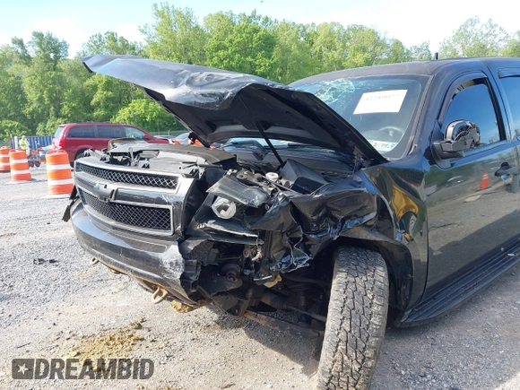 2013 Chevrolet Tahoe Commercial with VIN 1GNLC2E00DR265941, listed as a IAAI auction lot 42289977 with 206,840 mi miles and . Bid and sale history available at DreamBid. Image 6.