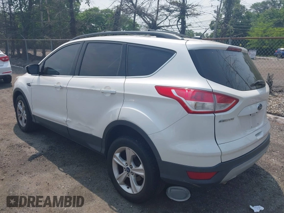 2013 Ford Escape SE z VIN 1FMCU9GXXDUD82847, wystawiony jako IAAI lot #42436360 z przebiegiem 142 071 mil mil oraz . Historia ofert i sprzedaży dostępna na DreamBid. Obrazek 3.